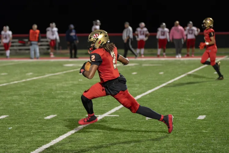 University High’s Kaleil Lewis can fill any role on the field
